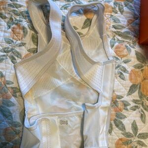 Ventilated dorsal vest for correcting posture. Worn one time.